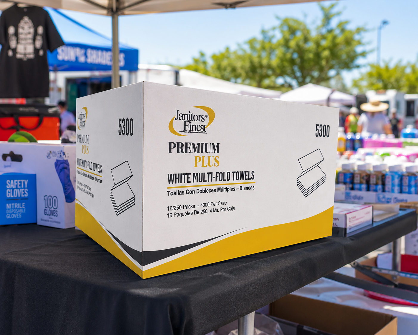 Janitors Finest 5300 multi-fold towels case on display at an outdoor event